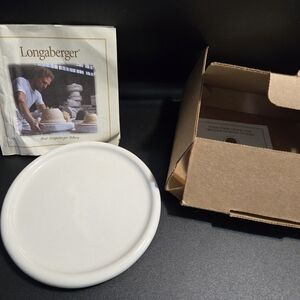 The Longaberger Woven Traditions 1-Pint Salt Crock Lid / Coaster in Ivory.